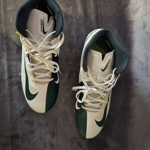Green and White Nike Athletic Shoes